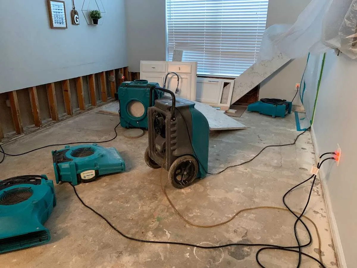 Dehumidifier in flood-cut room for Water Damage Restoration in Oakland